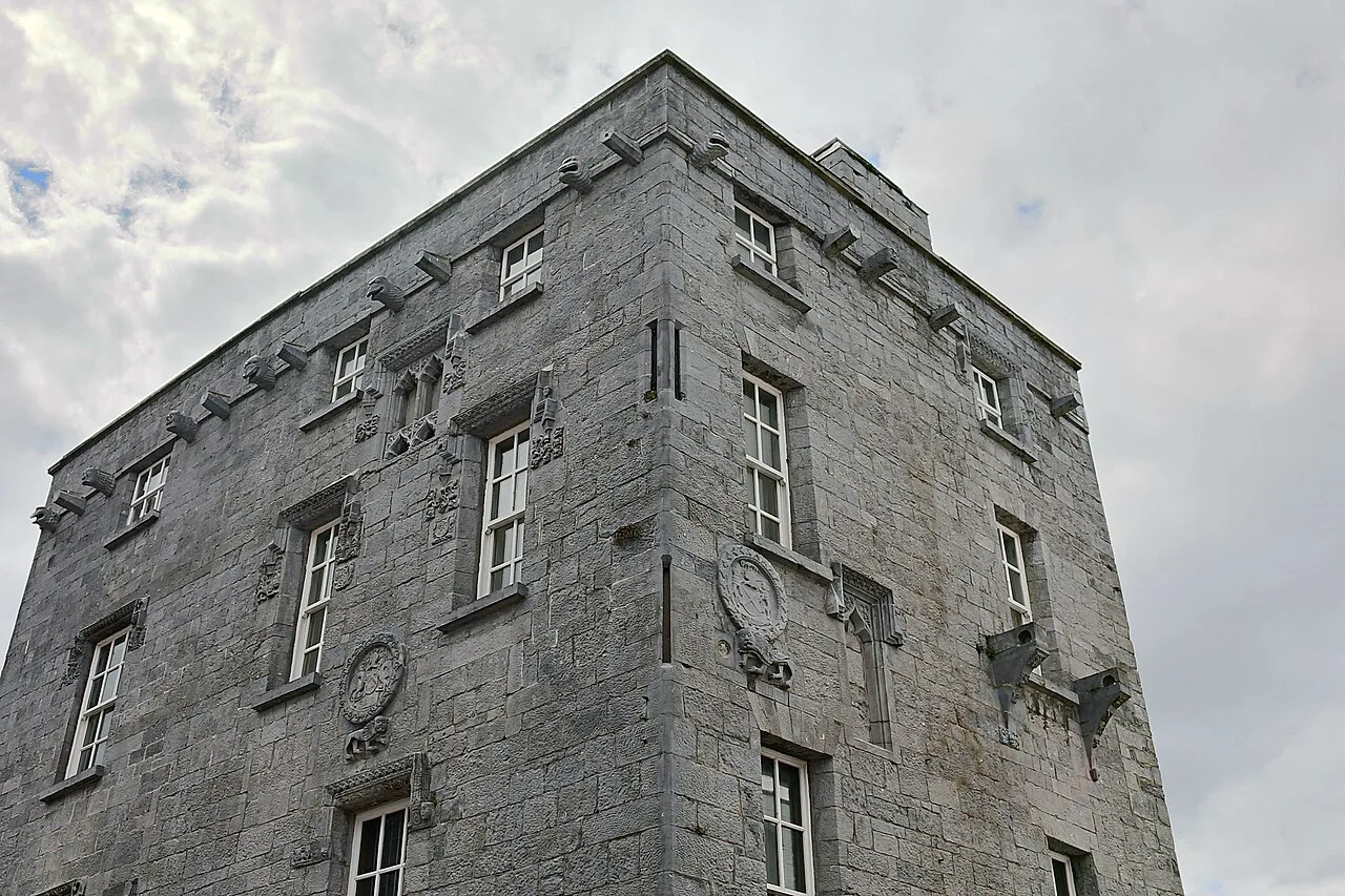Upper façade and carved details of Lynch’s Castle, Galway.