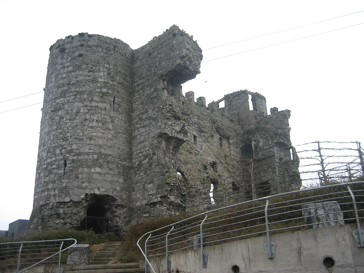 The surviving wall and towers of Carlow Castle.