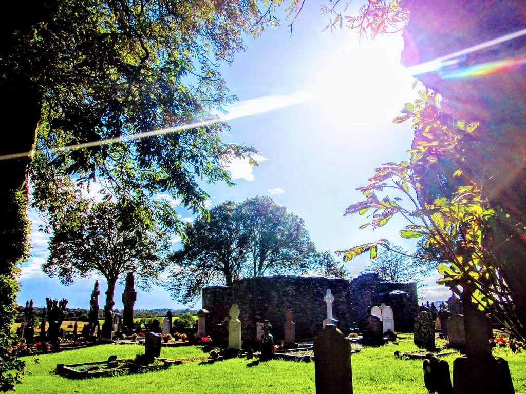 Round tower and graves at Monasterboice, County Louth.