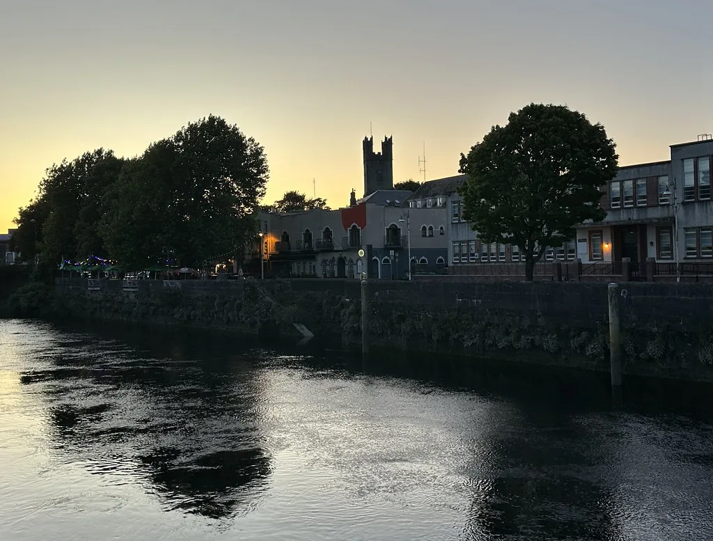 Limerick at dusk beside the river.