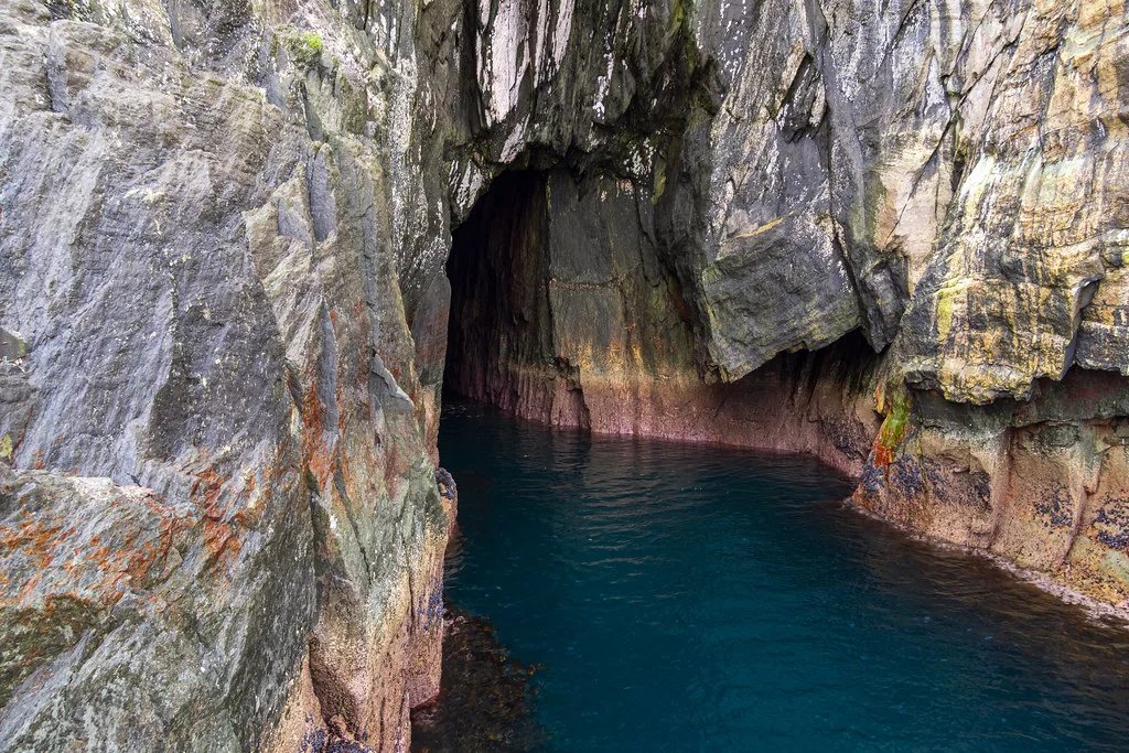 Coastal rock and sea cave beside Skellig Michael.
