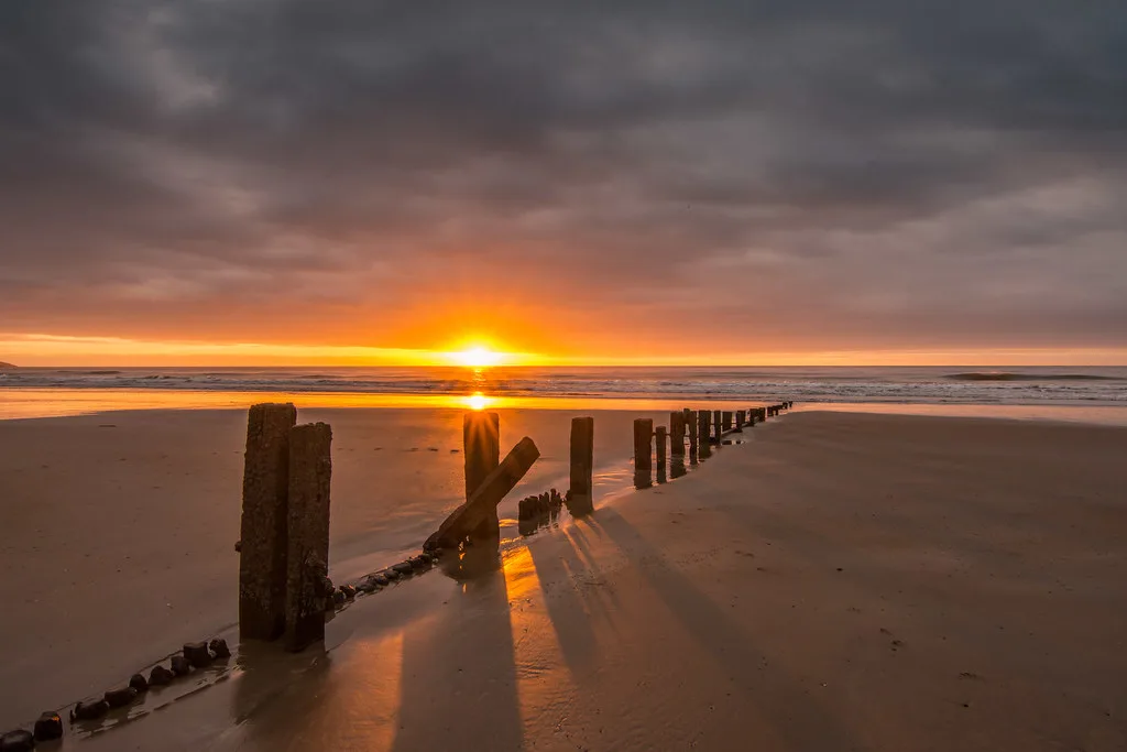 Sunrise on the strand at Youghal, County Cork.